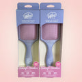 Wet brush paddle detangler